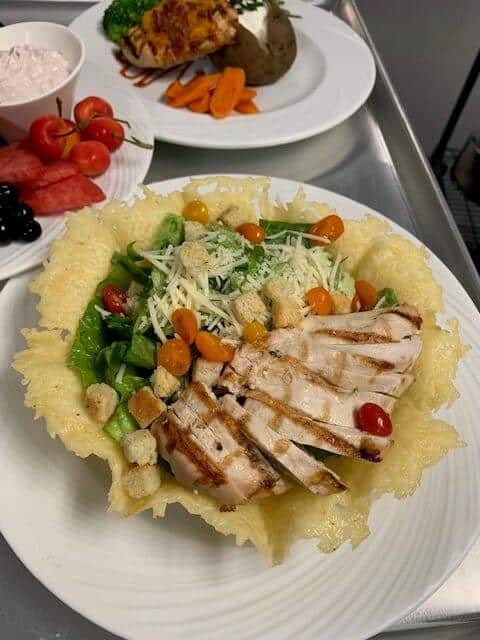 chicken salad in cheese tortilla bowl