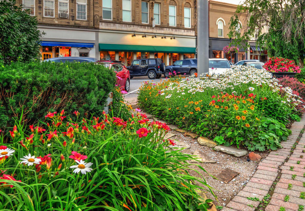 Photo of a flower covered path in historic downtown Chagrin Falls, OH.